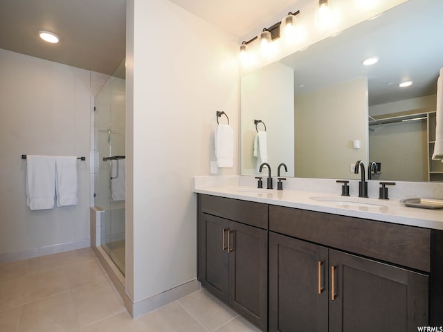 909 W Peace Tree Trl Unit 601, Heber City, UT 84032 - bathroom with a stall shower, tile patterned flooring, baseboards, and a sink