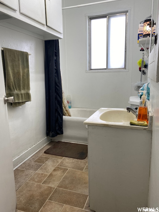 333 W Railroad Ave, Price, UT 84501 - bathroom with shower / tub combo, vanity, and tile flooring