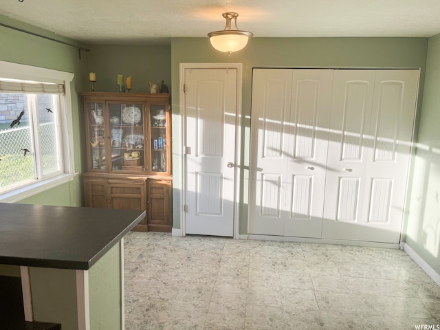 interior space with light tile floors
