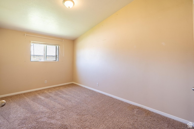 49 E 400 S, Monticello, UT 84535 - unfurnished room with carpet flooring, baseboards, and lofted ceiling