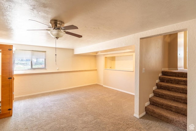 49 E 400 S, Monticello, UT 84535 - carpeted empty room featuring ceiling fan, stairs, baseboards, and a textured ceiling