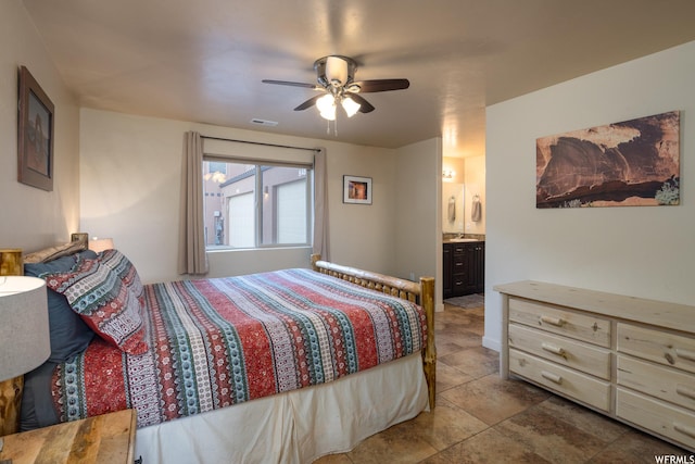 3862 Desert Willow Cir Unit 9-A1, Moab, UT 84532 - bedroom featuring connected bathroom and ceiling fan