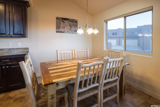 3862 Desert Willow Cir Unit 9-A1, Moab, UT 84532 - dining room featuring tile patterned floors, lofted ceiling, and a notable chandelier