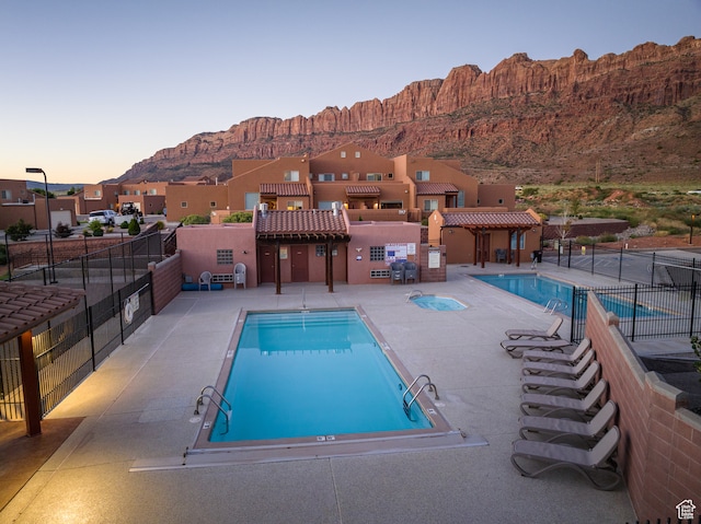3862 Desert Willow Cir Unit 9-A1, Moab, UT 84532 - view of swimming pool featuring a mountain view and a patio