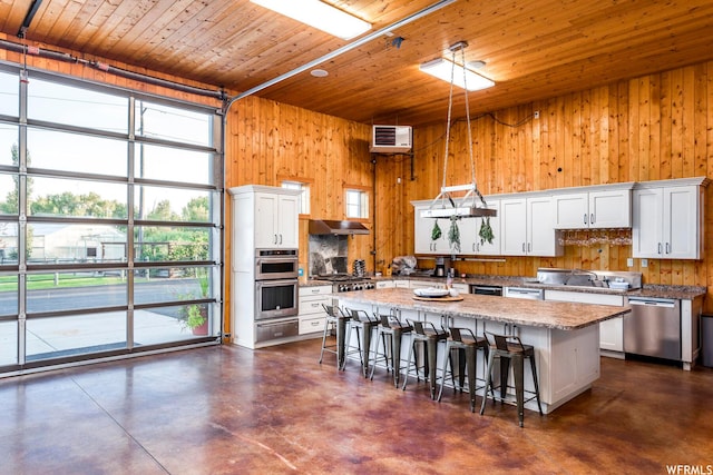 2085 W Midway Ln, Heber City, UT 84032 - kitchen featuring wood ceiling, concrete floors, stainless steel appliances, and wooden walls