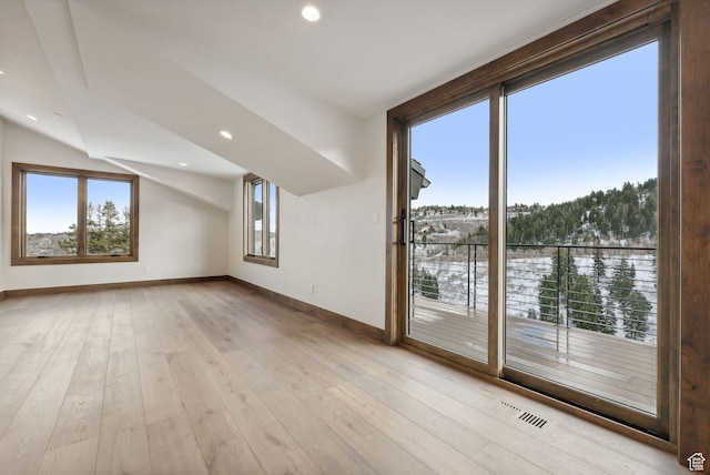 103 Alice Ct, Park City, UT 84060 - additional living space featuring baseboards, plenty of natural light, lofted ceiling, light wood finished floors, and recessed lighting