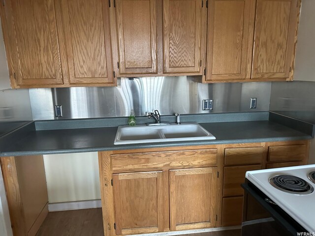 196 S Center St, American Fork, UT 84003 - kitchen with a sink, range with electric stovetop, and wood finished floors