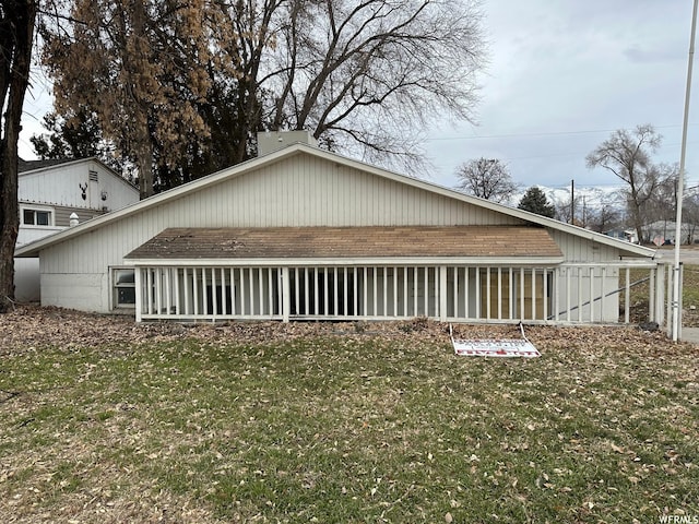 196 S Center St, American Fork, UT 84003 - exterior space featuring a yard, brick siding, and a shingled roof