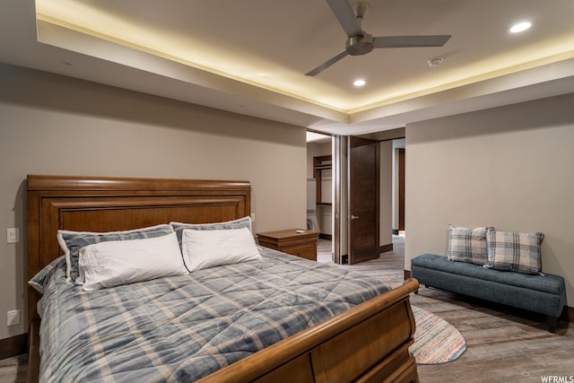854 W Tawgoo Ct, Ivins, UT 84738 - bedroom with recessed lighting, a raised ceiling, ceiling fan, and wood finished floors
