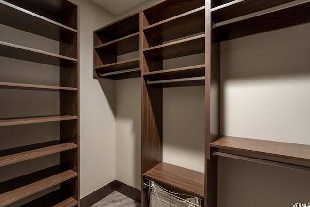 854 W Tawgoo Ct, Ivins, UT 84738 - spacious closet featuring dark wood finished floors
