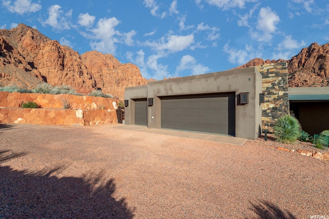 854 W Tawgoo Ct, Ivins, UT 84738 - exterior space featuring a garage and stucco siding