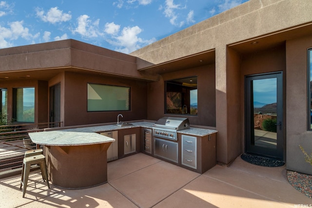 854 W Tawgoo Ct, Ivins, UT 84738 - view of patio / terrace with grilling area, exterior kitchen, and outdoor wet bar