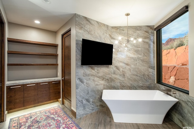 854 W Tawgoo Ct, Ivins, UT 84738 - full bath with a freestanding bath, tile walls, and recessed lighting