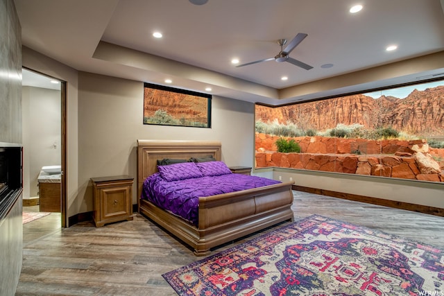 854 W Tawgoo Ct, Ivins, UT 84738 - bedroom with light wood-type flooring, baseboards, and recessed lighting