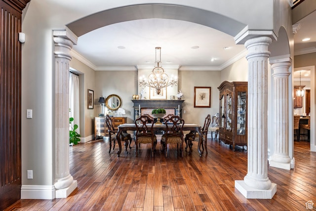 3626 E Granite Bench Ln S, Sandy, UT 84092 - dining space featuring dark hardwood / wood-style floors, ornamental molding, an inviting chandelier, and ornate columns
