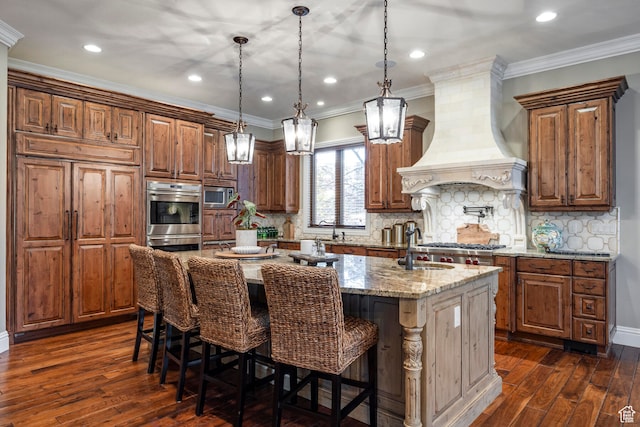 3626 E Granite Bench Ln S, Sandy, UT 84092 - kitchen featuring a breakfast bar area, premium range hood, dark hardwood / wood-style floors, and a center island with sink