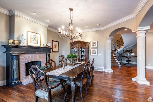 3626 E Granite Bench Ln S, Sandy, UT 84092 - dining area featuring ornamental molding, dark hardwood / wood-style flooring, decorative columns, a fireplace, and a notable chandelier