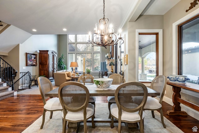 3626 E Granite Bench Ln S, Sandy, UT 84092 - dining area featuring a chandelier, a healthy amount of sunlight, and dark hardwood / wood-style floors