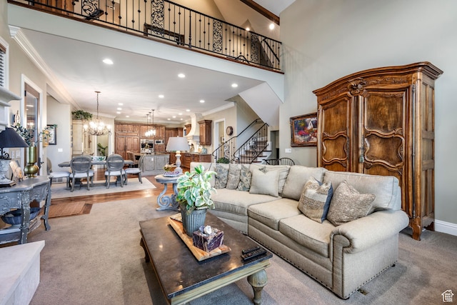 3626 E Granite Bench Ln S, Sandy, UT 84092 - living room with a high ceiling, light carpet, a chandelier, and ornamental molding