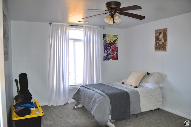 1605 Foxmore St, Pocatello, ID 83204 - bedroom featuring dark carpet and ceiling fan