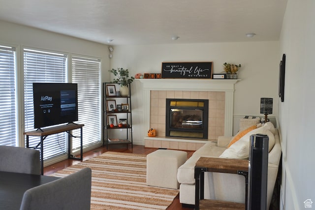 1605 Foxmore St, Pocatello, ID 83204 - living room featuring dark hardwood / wood-style floors and a tile fireplace