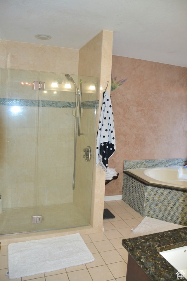1605 Foxmore St, Pocatello, ID 83204 - bathroom featuring independent shower and bath, tile floors, and vanity