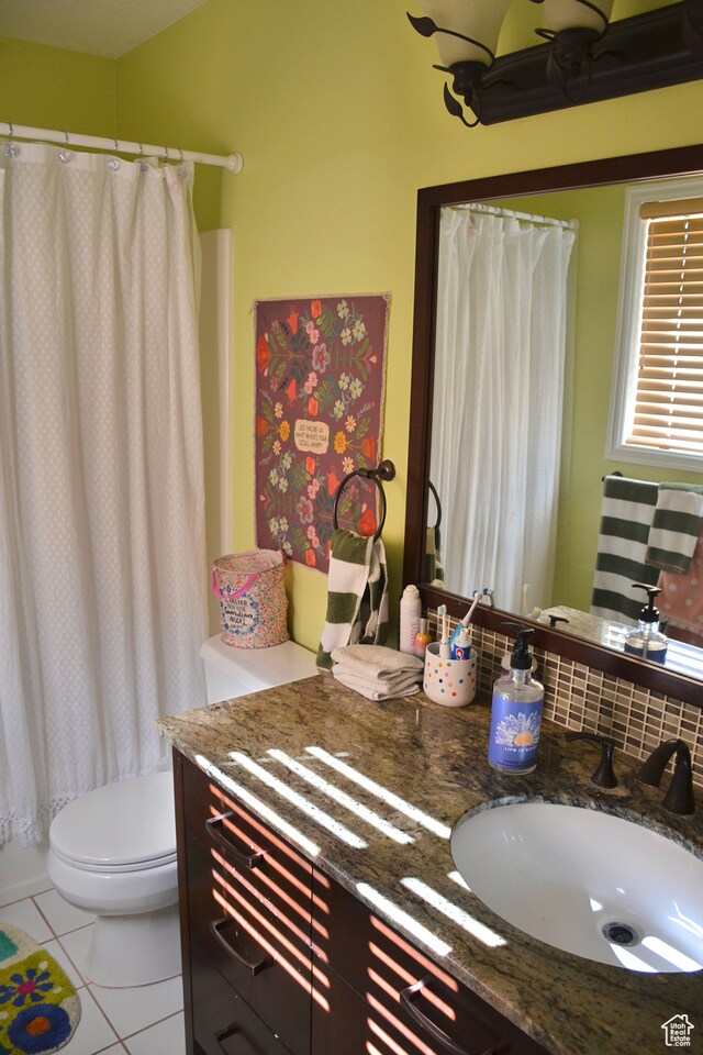 1605 Foxmore St, Pocatello, ID 83204 - bathroom with toilet, tile floors, and oversized vanity