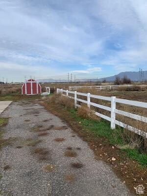 2794 W Gentile N, Layton, UT 84041 - view of gate featuring a rural view and a storage shed