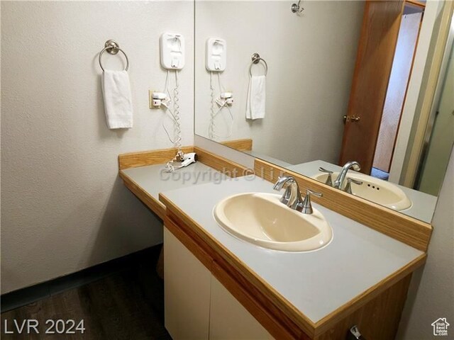 223 Hunter Ridge Rd Unit A202, Brian Head, UT 84719 - bathroom featuring sink and hardwood / wood-style floors