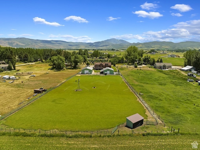 surrounding community with a mountain view and a rural view