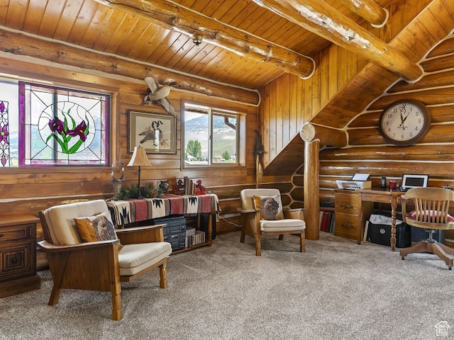 living area featuring carpet flooring, rustic walls, and wooden ceiling