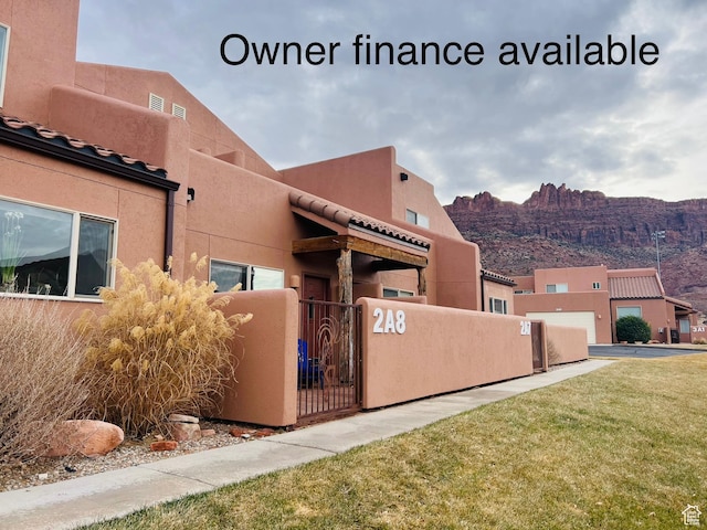 3764 Prickly Pear Cir Unit 2-A8, Moab, UT 84532 - view of building exterior with a mountain view