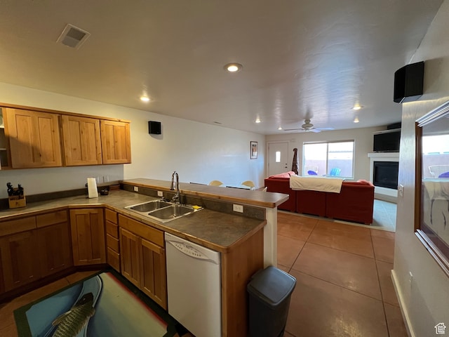 3764 Prickly Pear Cir Unit 2-A8, Moab, UT 84532 - kitchen with light tile patterned flooring, sink, white dishwasher, and kitchen peninsula