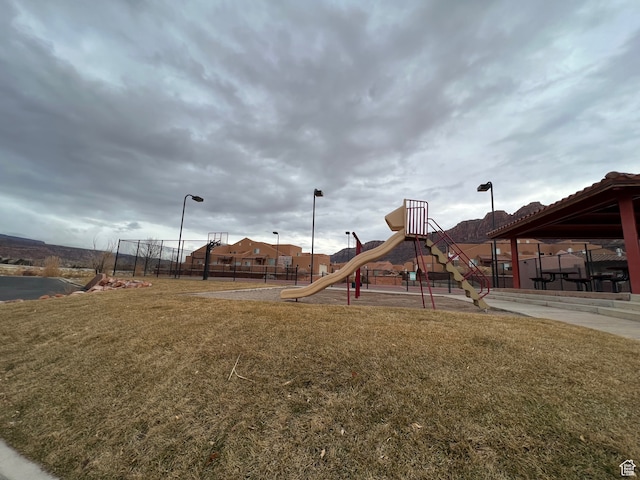 3764 Prickly Pear Cir Unit 2-A8, Moab, UT 84532 - view of playground with a lawn