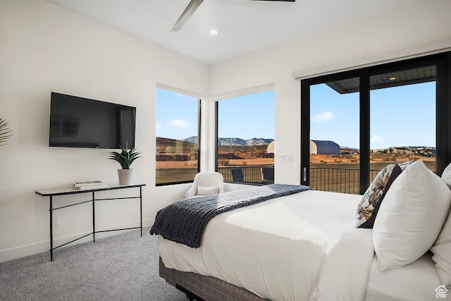 1560 W Torrey Pines Rd, Hurricane, UT 84737 - bedroom with ceiling fan, access to exterior, and light colored carpet