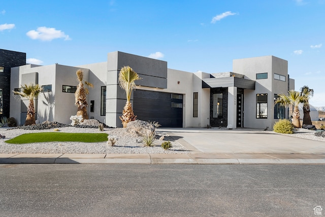 1560 W Torrey Pines Rd, Hurricane, UT 84737 - modern home with a garage