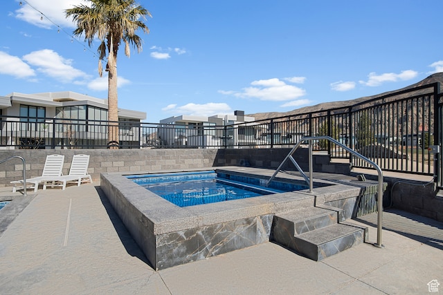 1560 W Torrey Pines Rd, Hurricane, UT 84737 - view of swimming pool featuring a community hot tub and a patio