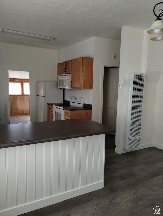 182 E 9000 S, Sandy, UT 84070 - kitchen with hanging light fixtures, white appliances, and dark hardwood / wood-style floors
