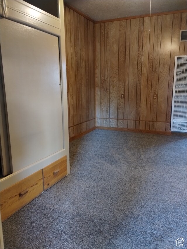 182 E 9000 S, Sandy, UT 84070 - unfurnished room featuring carpet floors and wooden walls