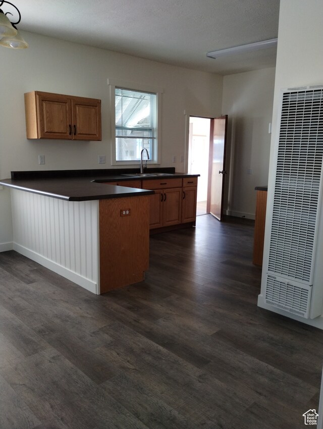 182 E 9000 S, Sandy, UT 84070 - kitchen with dark hardwood / wood-style flooring, sink, and kitchen peninsula