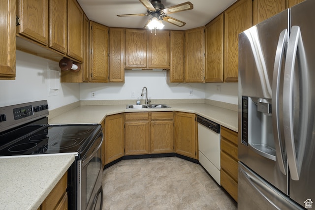 491 Mountain View Dr, Moab, UT 84532 - kitchen with ceiling fan, sink, and stainless steel appliances