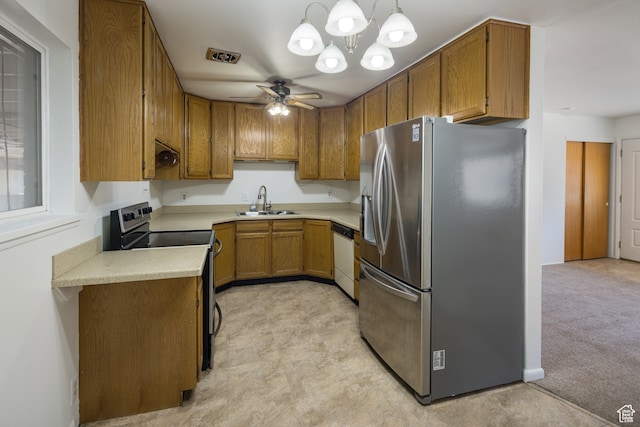 491 Mountain View Dr, Moab, UT 84532 - kitchen with light carpet, white dishwasher, range with electric cooktop, stainless steel fridge, and decorative light fixtures
