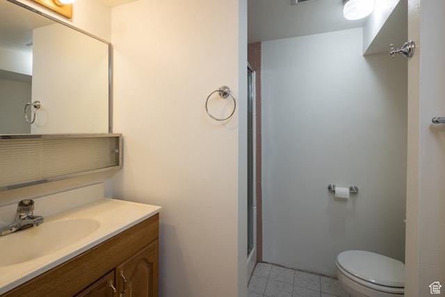 491 Mountain View Dr, Moab, UT 84532 - bathroom with tile patterned floors, vanity, toilet, and walk in shower