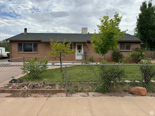 491 Mountain View Dr, Moab, UT 84532 - ranch-style home with a front yard