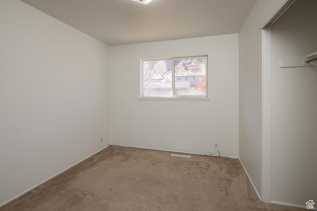491 Mountain View Dr, Moab, UT 84532 - spare room featuring light carpet