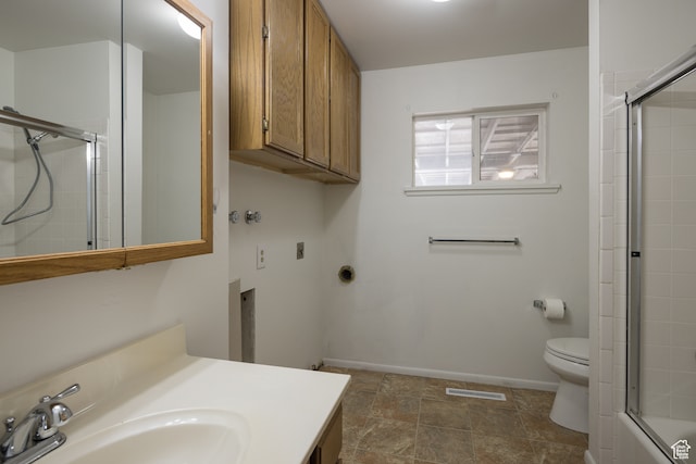 491 Mountain View Dr, Moab, UT 84532 - full bathroom with vanity, combined bath / shower with glass door, and toilet
