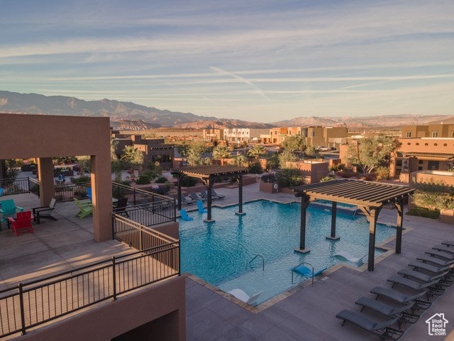 3209 S Dyami Vw Unit 11, Hurricane, UT 84737 - view of swimming pool with a mountain view and a patio