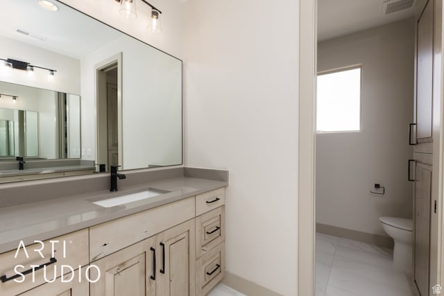 3209 S Dyami Vw Unit 11, Hurricane, UT 84737 - bathroom with tile floors, toilet, and vanity