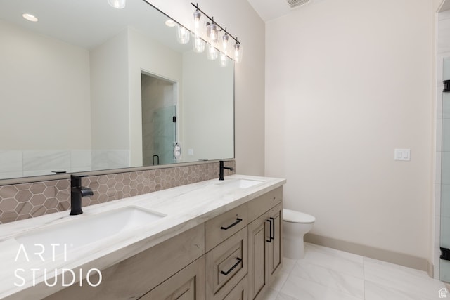 3209 S Dyami Vw Unit 11, Hurricane, UT 84737 - bathroom featuring dual vanity, tile floors, and toilet