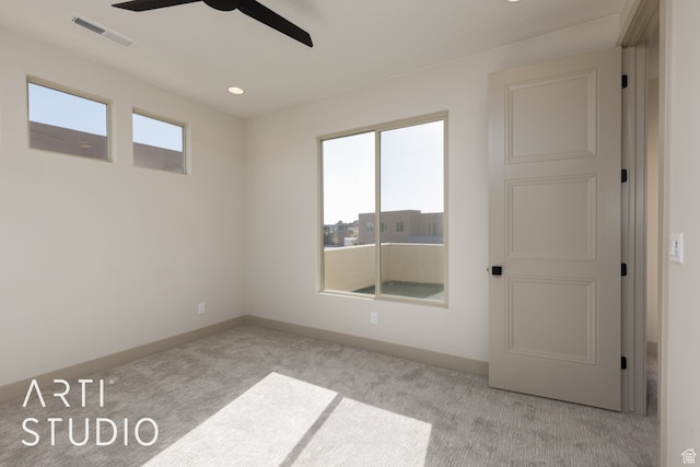 3209 S Dyami Vw Unit 11, Hurricane, UT 84737 - unfurnished room featuring ceiling fan, a wealth of natural light, and light colored carpet